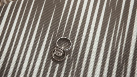 Composition Of Two Wedding Rings At The Table. Stock Footage 95906855