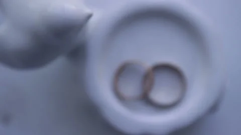 Composition of two wedding rings at the table. Stock Footage 113338599
