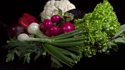Composition of vegetables salad, beetroot, cauliflower and others on a rotati Stock Footage 155460173