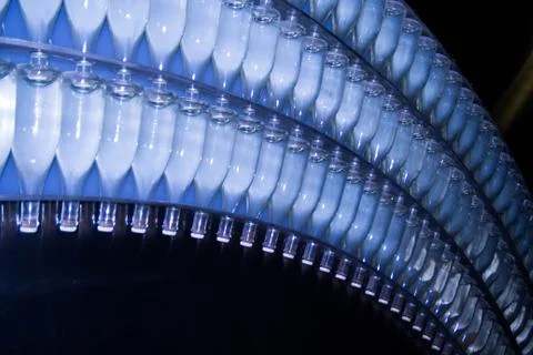 Composition in the wall from bottles with champagne Stock Photos