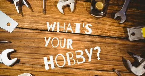 Composition of what's your hobby text with work tools on wooden table Stock Photos