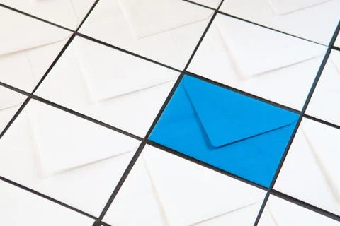 Composition with white and blue envelopes on the table. Stock Photos