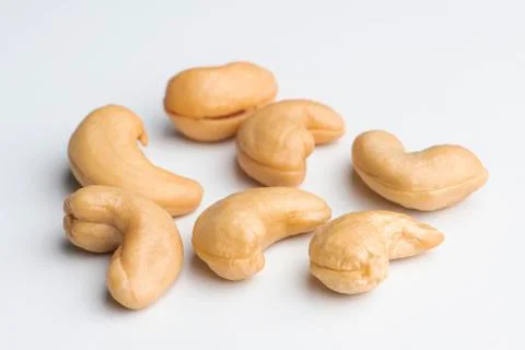 Composition of whole cashews on a white background Stock Photos