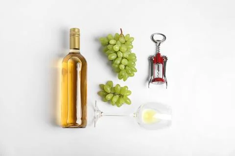 Composition with wine and grape on white background, top view 스톡 사진