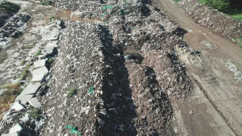 Compost and composted soil as a composting pile. composted soil pile at the c Stock Footage 220884481
