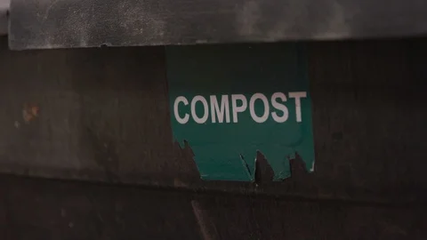 Compost bin worn out green sign Video stock 100824207