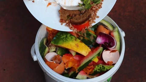 Compost container for the kitchen. Leftovers and Scraps Stock Footage 92882856