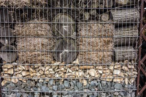Compost yard with equipment for processing crop residues and shelters for b.. Stock Photos