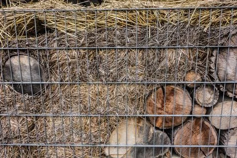 Compost yard with equipment for processing crop residues and shelters for b.. Stock Photos
