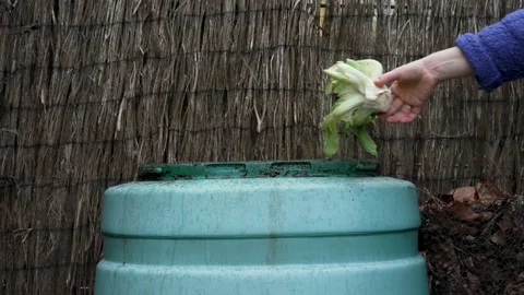 Composting Kitchen Scraps in the Compost Bin, Recycling and Zero Waste Living Stock Footage 294534162