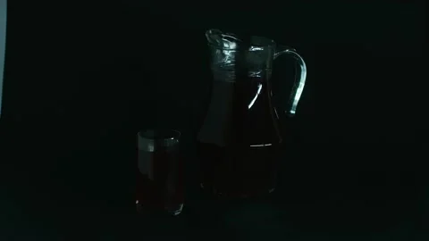 Compote of cherries in a decanter in a decanter, and a glass, presentation, play Stock Footage 153806743