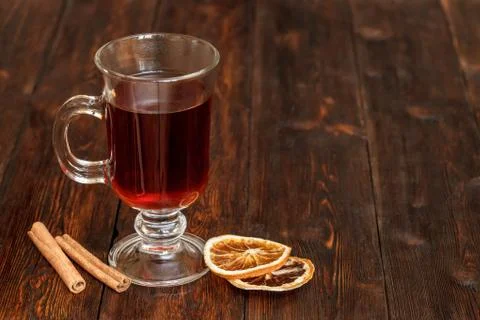 Compote or tea with fruit ingridients, dried orange, cinnamon. Copyspace Stock Photos