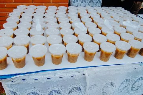 Compote in a plastic cup Stock Photos