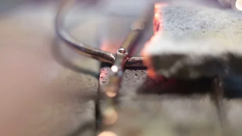 Compound thin products at high temperature on the hot stones of fire Stock Footage 73286343