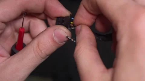 A Comprehensive Guide to Understanding Electrical Wiring Techniques in CloseUp Stock Footage 311367494