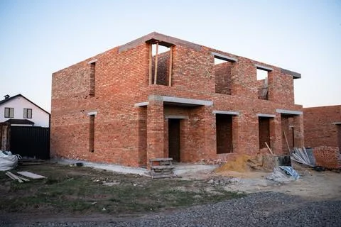 Comprehensive process of building a modern two-story residential house Фото