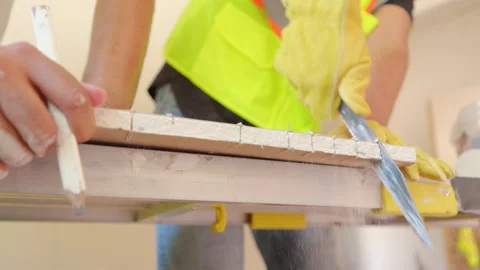 The Comprehensive Tile Installation Process Using Various Tools at a Video stock 305824351