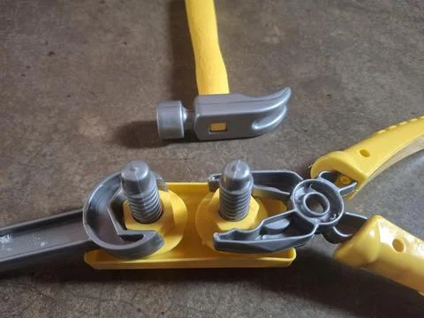 Comprehensive tool kit includes screwdriver, clamp, hammer, and more, Stock Photos