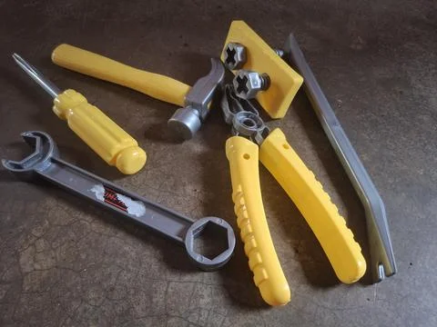 Comprehensive tool kit includes screwdriver, clamp, hammer, and more, Stock Photos