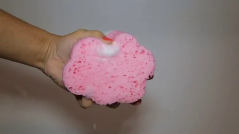 Compress the soap sponge Stock Footage 80979568