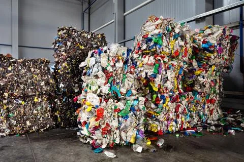 Compressed bales of polyethylene used PET bottles from drinks and detergents Stock Photos