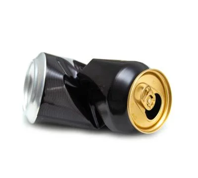 Compressed can isolated on a white background, Aluminum recycling old cans. Stock Photos