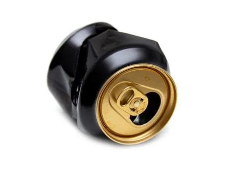 Compressed can isolated on a white background, Aluminum recycling old cans. Stock Photos