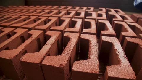 Compressed earth blocks construction bricks interlock CSEB Stock Footage 154204690