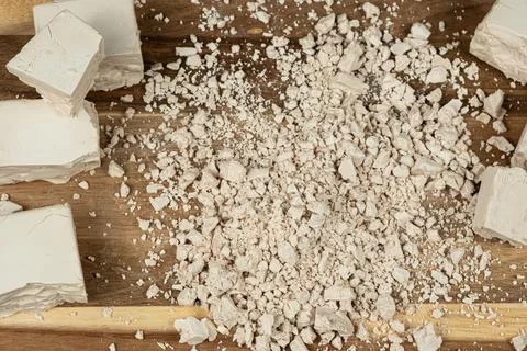 Compressed fresh yeast cubes close-up on a wooden background Stock Photos