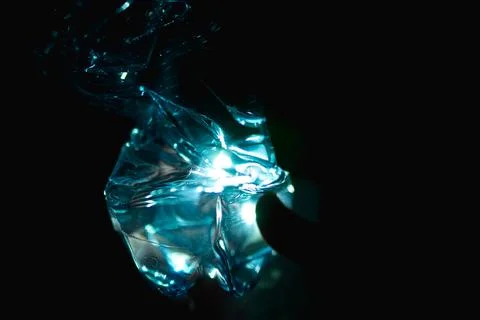 Compressed Transparent Plastic Bottle with Water Stock Photos