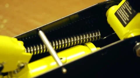 Compressing jack spring during hydraulic mechanism movement Stock Footage 323606029