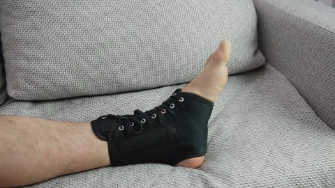 Compression fixed in ankle stabilizer medical bandage. Fracture or Leg sprain Stock Footage 171622257