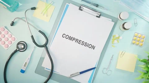 COMPRESSION WRITTEN ON MEDICAL PAPER 스톡 동영상 308102030