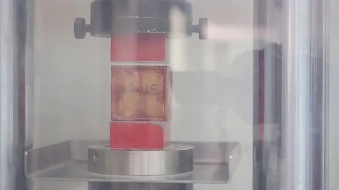 Compressive strength test of concrete using in the industrial construction Stock Footage 82206703