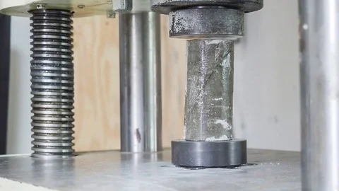 Compressive strength test of concrete using in the industrial construction. Stock Footage 82207286