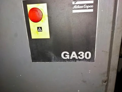 Compressor Door Control Panel With Red Button Located in Industrial Facility Stock Photos