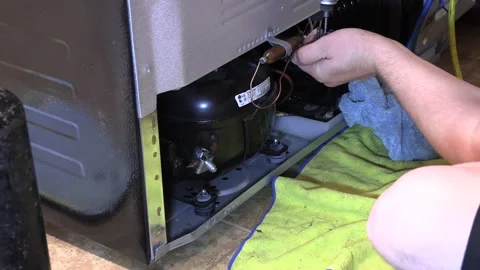 Compressor replacement, removing freon Stock Footage 161034508