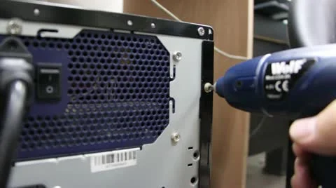 Compter technician using drill Stock Footage 21595834