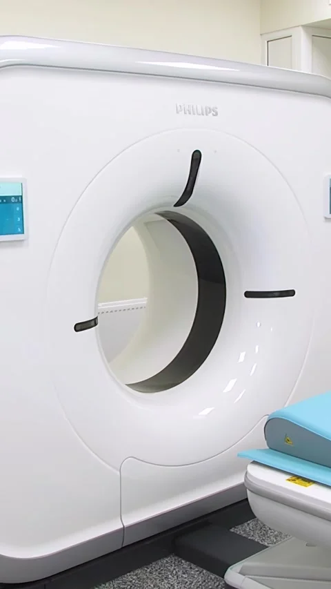 Computed axial tomography (CAT). CT scanner.  - Vertical video. Stock Footage 318836284