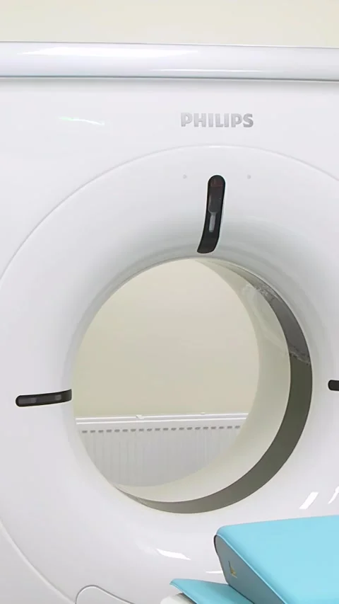 Computed axial tomography (CAT). CT scanner.  - Vertical video. Stock Footage 318836286