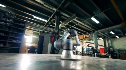 Computed machine rotates on a table, working in a facility. Stock Footage 110213981