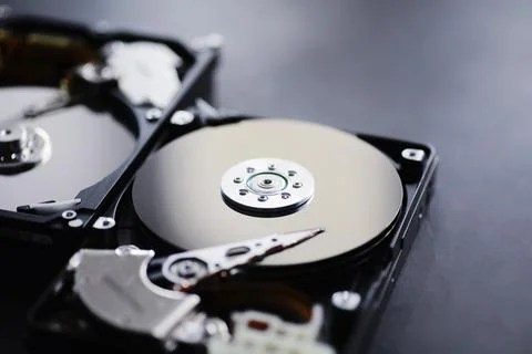 Computer accessories. The disassembled hard drive. Repair of components PC... Stock Photos