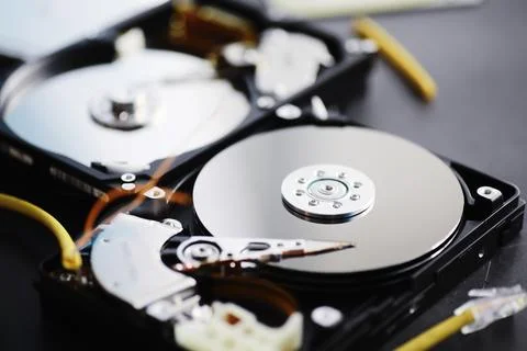 Computer accessories. The disassembled hard drive. Repair components PC. Brok Stock Photos