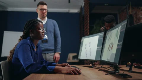 Computer-aided engineering in modern office, multi ethnic group of people 動画素材 231349860