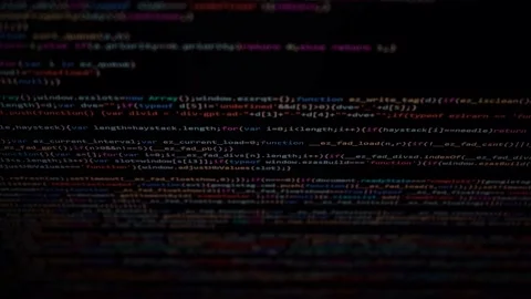 Computer algorithm scrolling on a dark monitor showing coding lines Stock Footage 168275150