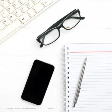 Computer and notepad with smart phone Stock Photos