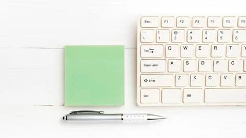 Computer and sticky note Stock Photos