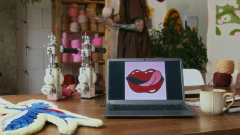 Computer and Tools on Table in Rug Tufting Studio Stock Footage 316495896