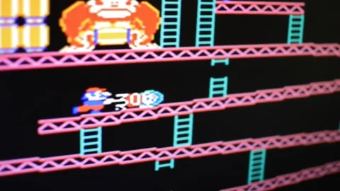 Computer arcade video game. fun play on arcade game toy Stock-Footage 195285344