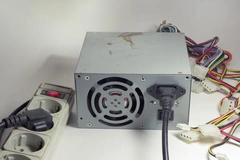 Computer ATX non-modular power supply unit, with connected power cord. swit.. Stock Photos